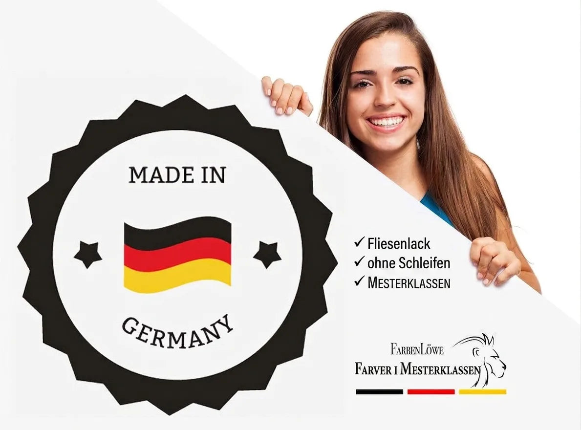 Smilende kvinde holder skilt med ‘Made in Germany’-mærke og FarbenLöwe Kongeklasse-farver.