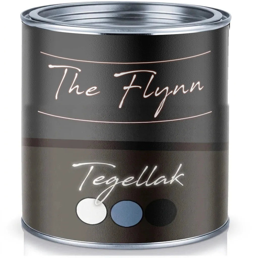 Blik The Flynn tegellak met kleurstalen in wit, blauwgrijs en zwart, staand op een witte ondergrond.