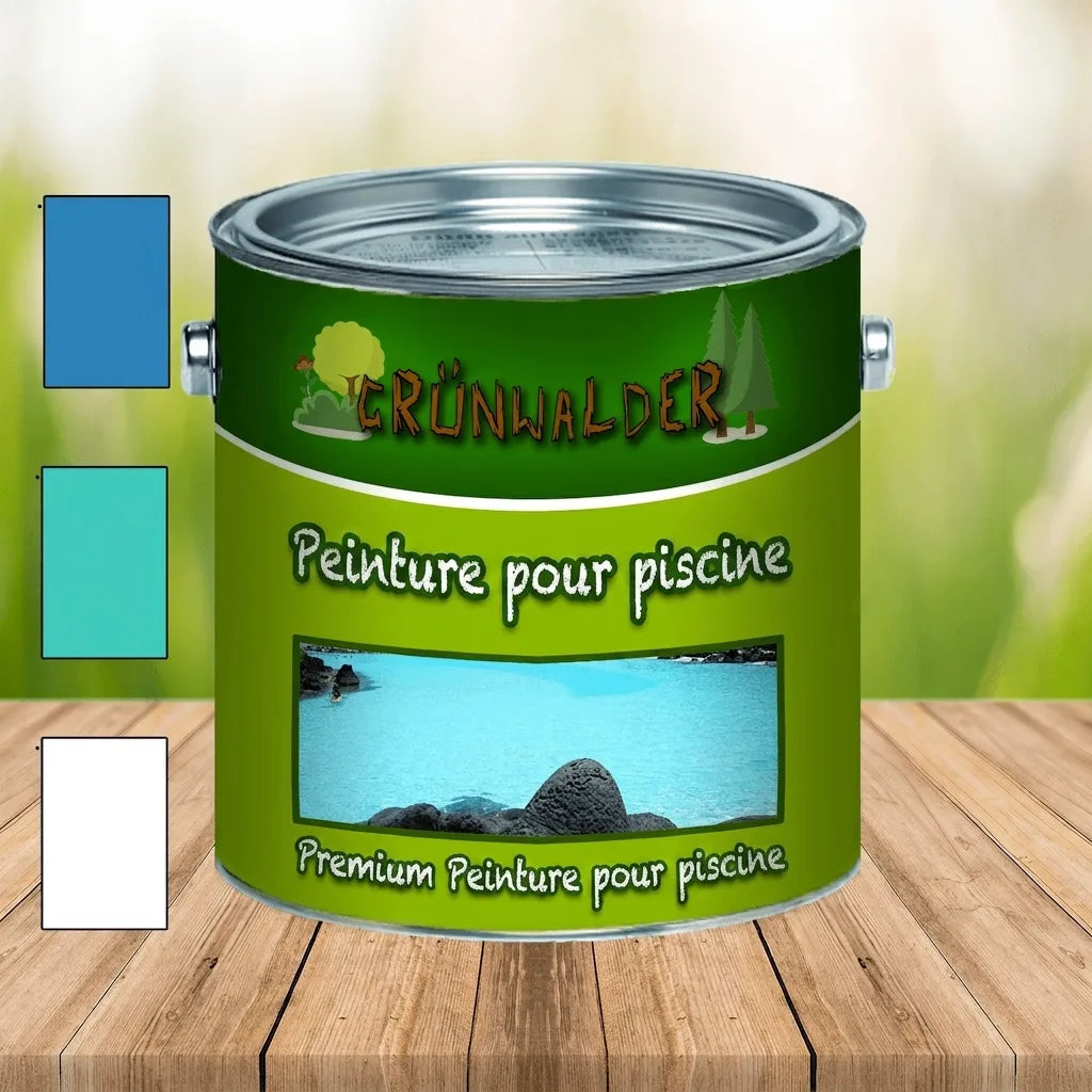 Pot de peinture Grünwalder pour piscines avec échantillons de couleurs bleu, sarcelle et blanc, sur une table en bois.