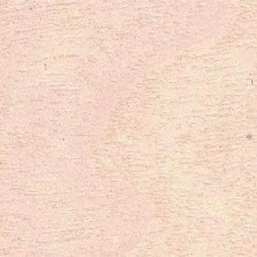 Textura de superficie de madera clara o material textil en tono beige rosado con grano sutil.