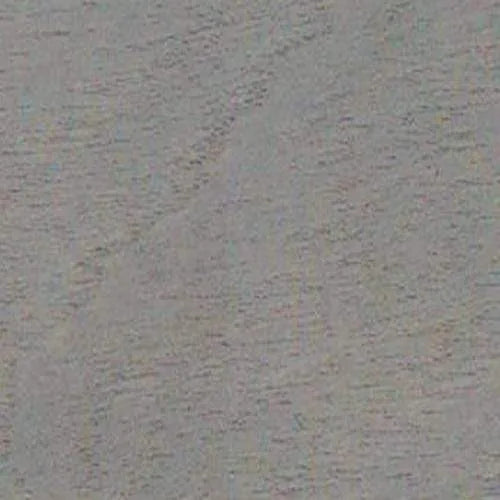 Textura de superficie gris mate o de madera con vetas sutiles.