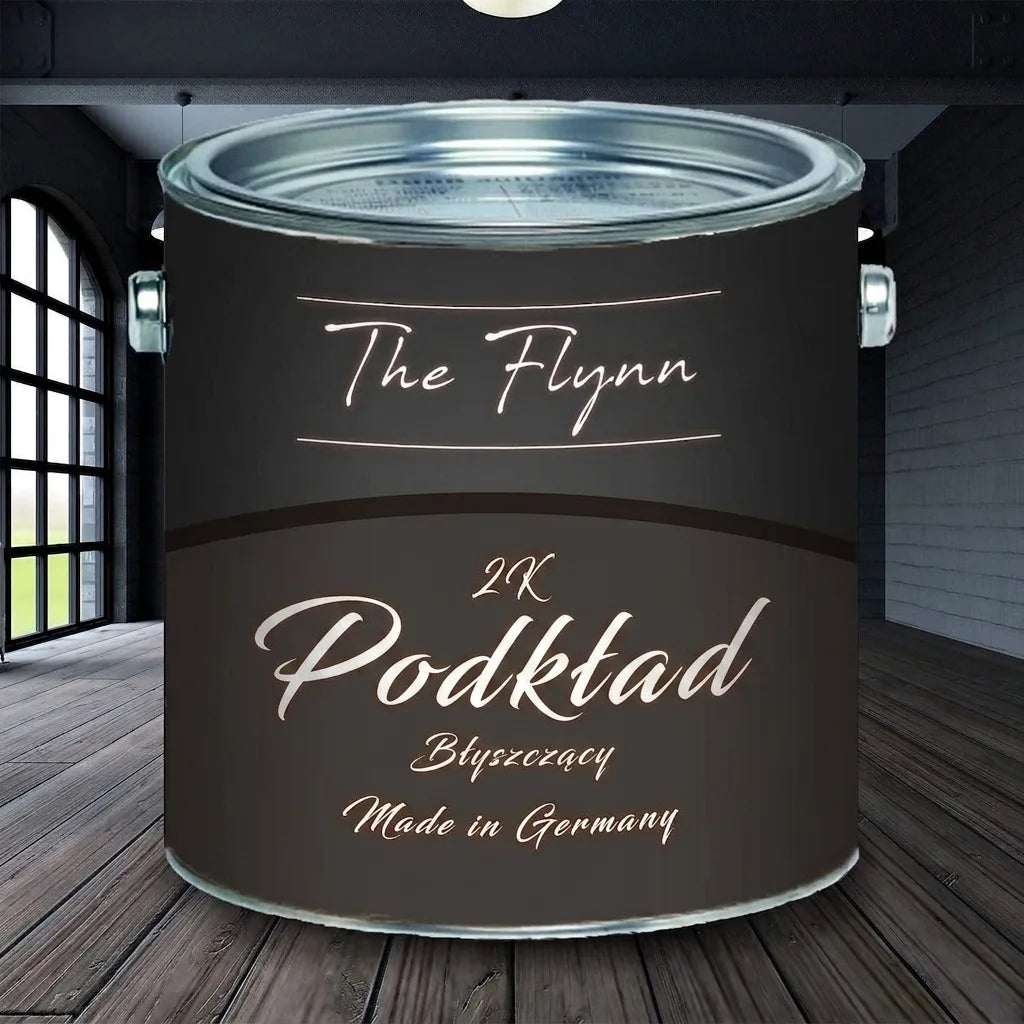 Czarna puszka farby The Flynn 2K Grundierung (podkład), błyszczący, Made in Germany, na drewnianej podłodze.
